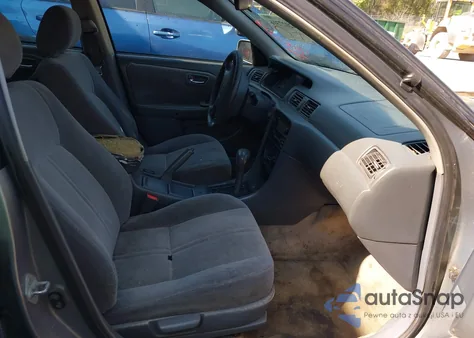 2001 Toyota Camry Le z USA, uszkodzony, nr VIN JT2BG22K110591447